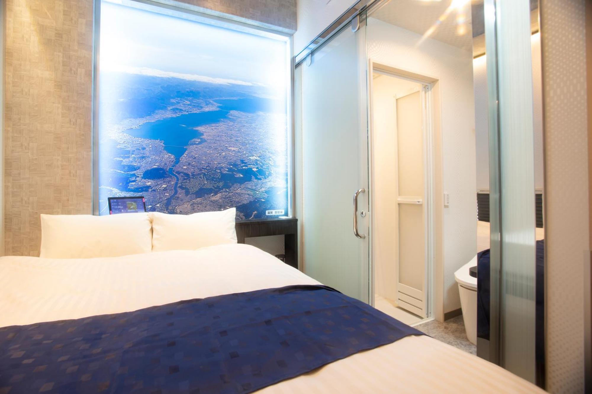 Hotel Xcell Hiroshima Nagarekawa חדר תמונה